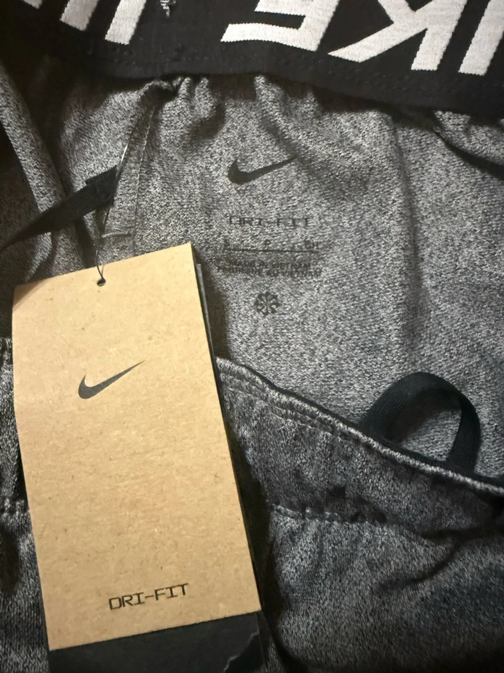Nike Women’s Heather Gray Athletic Shorts with Subtle Swoosh